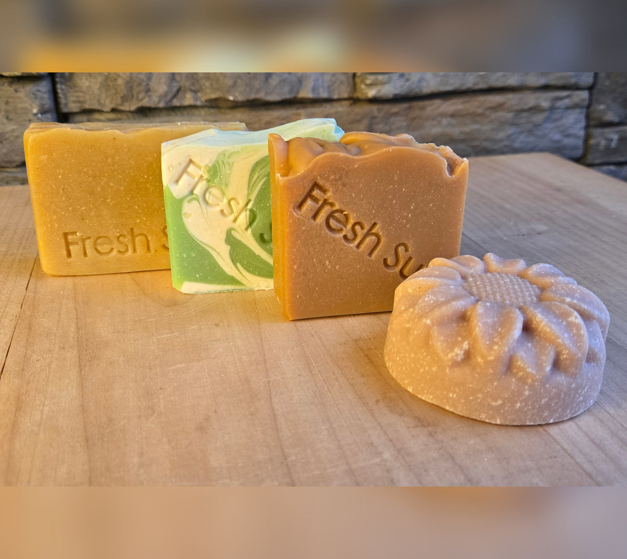 Fresh Favourites soap bundle, four real soap bars on a wood table