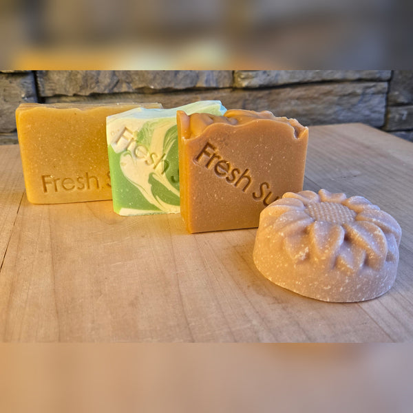 Fresh Favourites soap bundle, four real soap bars on a wood table