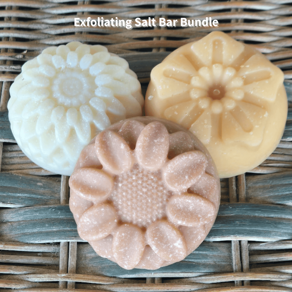 3 flower shaped soap bars made with mineral salts on wicker background