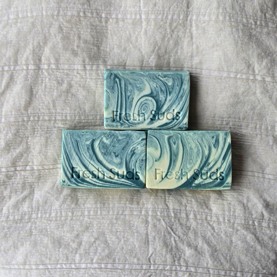 Three Glacier Arctic Mineral Clay bars on linen