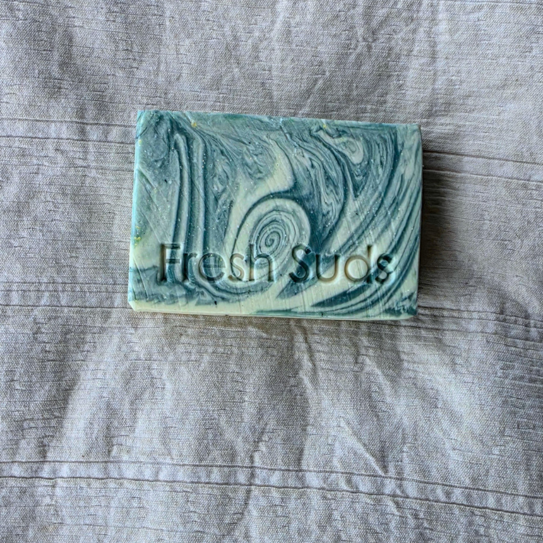 Glacier Arctic Mineral Clay bar on linen, top view
